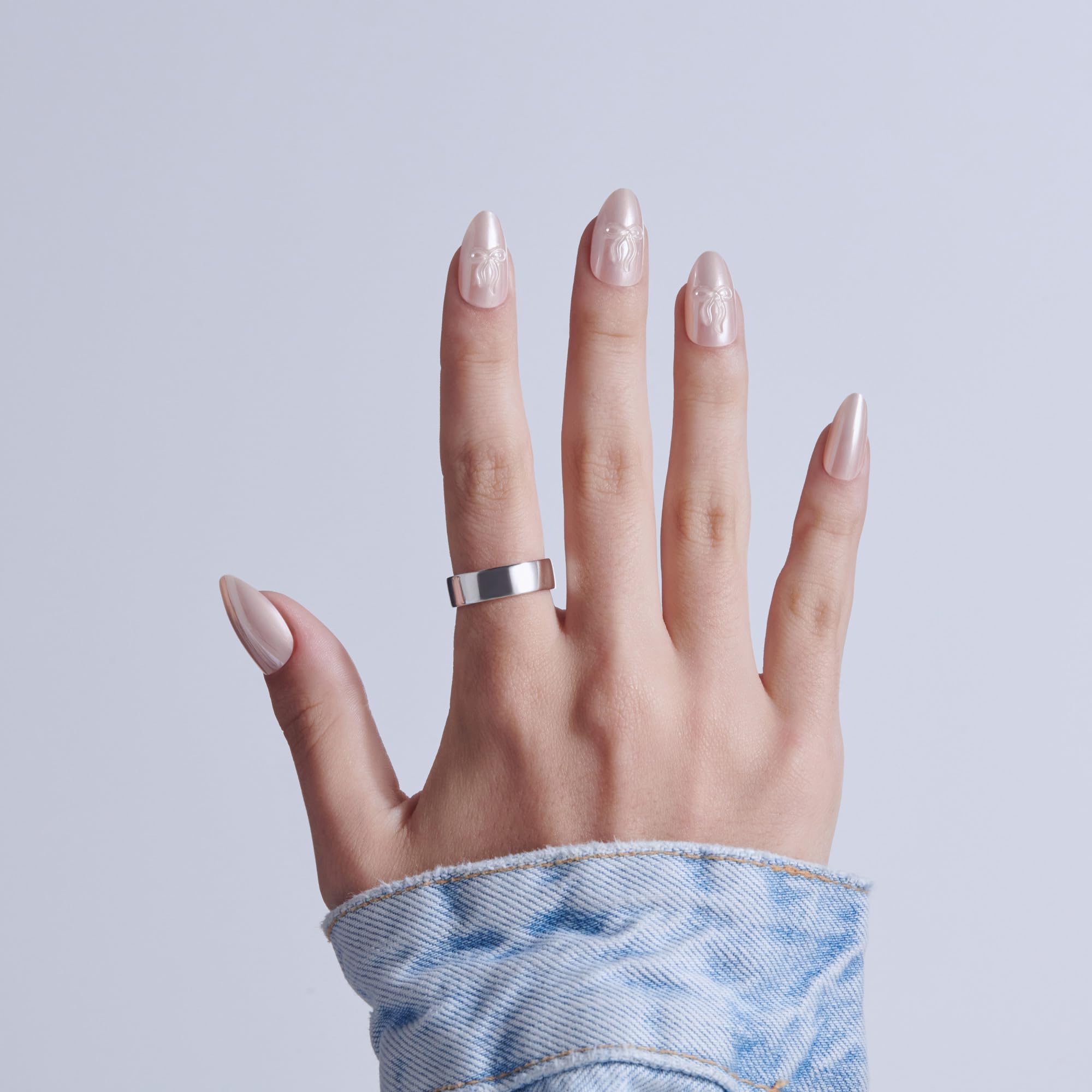 KISS jewel embellishment detail showing sparkle and elevated manicure look