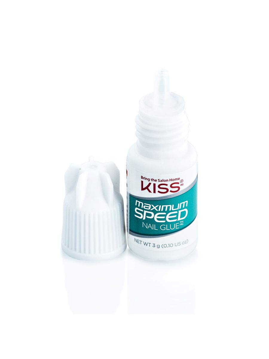 KISS glue on a bathroom vanity with press-on nails showing convenient at-home use