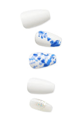 KISS nails being pressed on showing quick application and immediate polished look