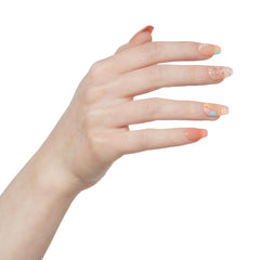 KISS close-up of nude pink floral design highlighting polish-free detail and texture