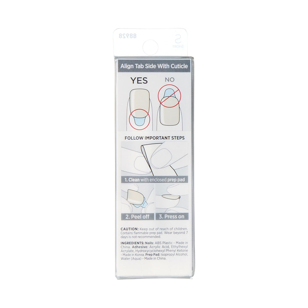 KISS nails beside a ruler showing short squoval size and wearable length