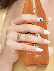 KISS nails on hand showing medium coffin size and realistic scale for styling choice