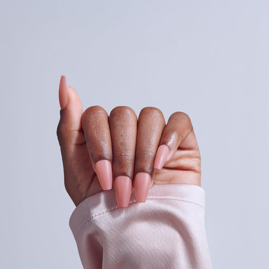 KISS close-up of coffin shape nails highlighting clean edges benefit: modern polished look