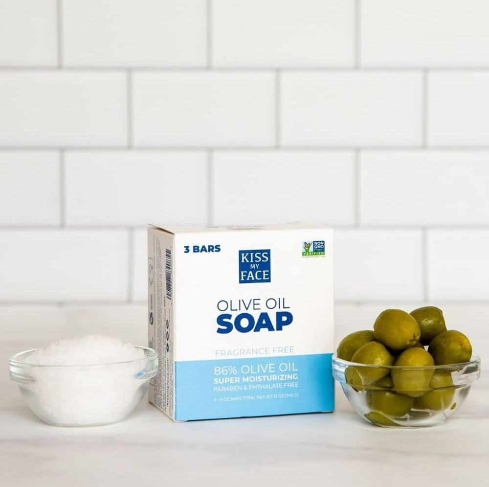 Kiss My Face olive ingredient visual emphasizing cold-pressed oil nourishment