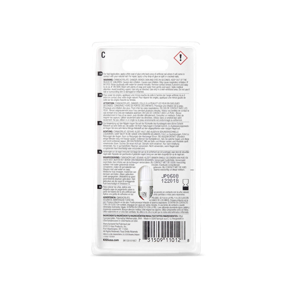 KISS nail glue in hand applying to press-on nail for quick secure hold