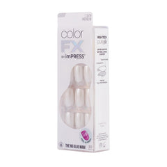 Hand applying a KISS press-on nail demonstrating easy peel-and-press convenience