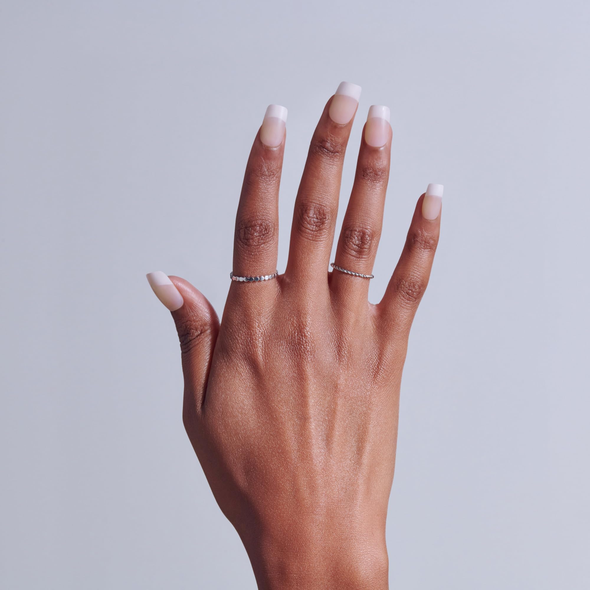 KISS close-up of squoval nail edge highlighting smooth shape and salon finish