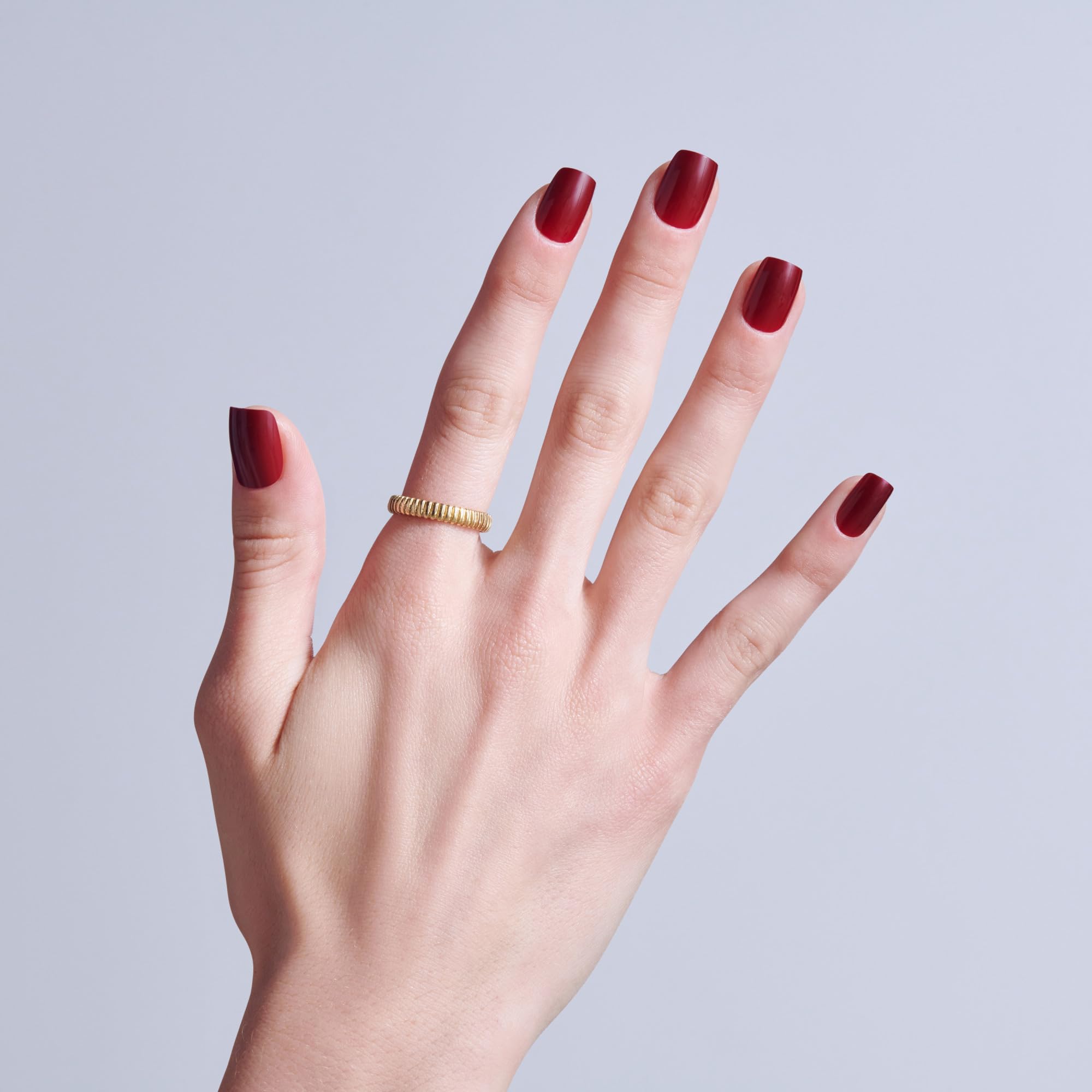 Array of 32 KISS nails displayed by size demonstrating varied sizing for a better fit