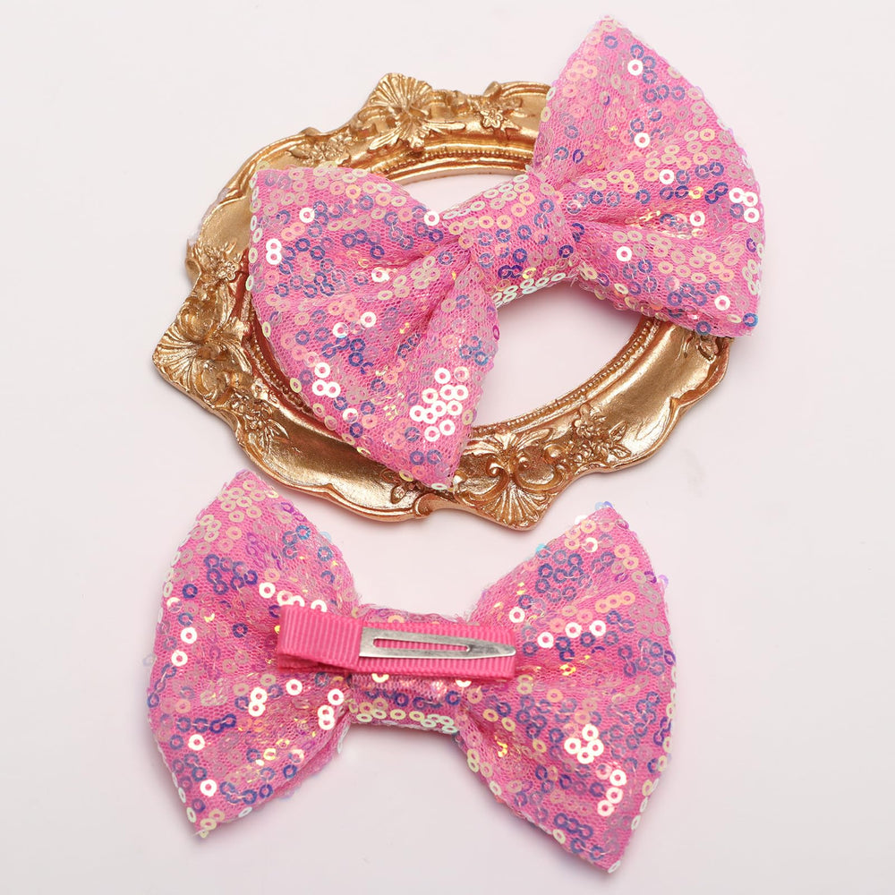 Kiszu bow clipped in child's hair side view adding sparkle