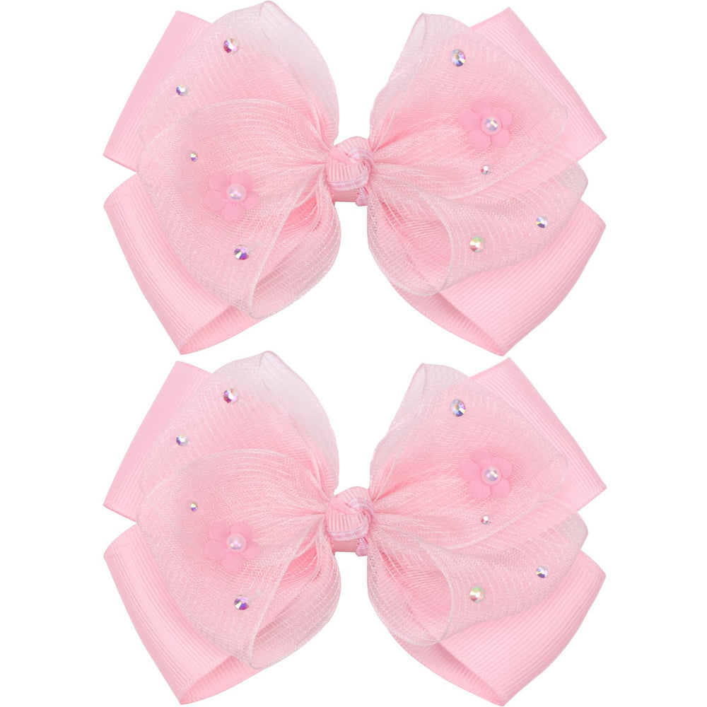 Kiszu front view of pink bow clip showing overall shape and charm