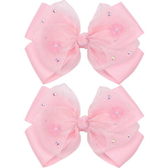 Kiszu front view of pink bow clip showing overall shape and charm