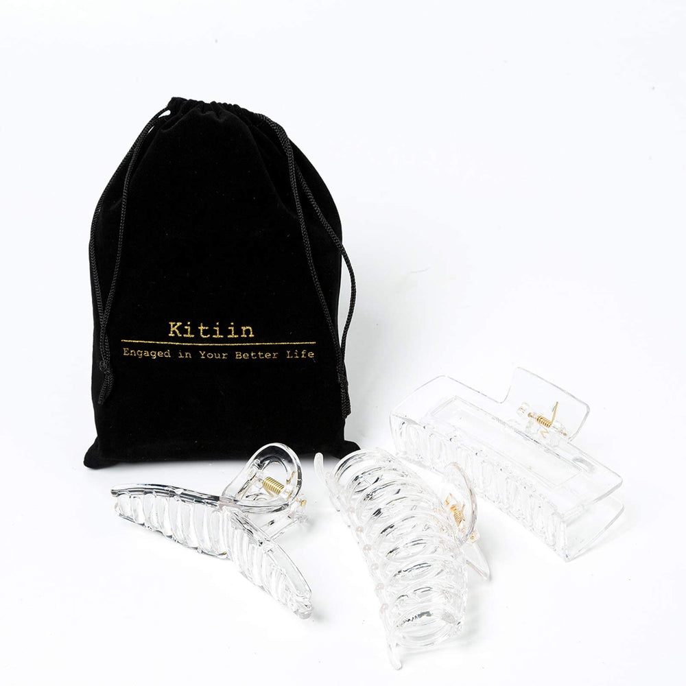 Kitiin clip in use securing a neat updo for fast elegant styling