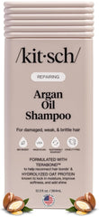 Kitsch bottle front packaging showing product and benefit of strengthening