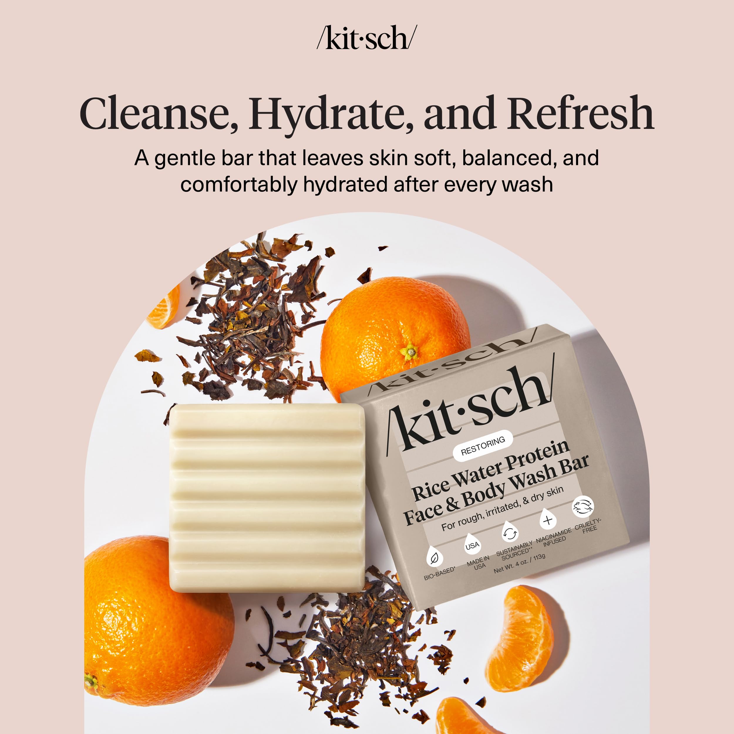 Kitsch soap bar held in hand to show compact 4 oz travel-friendly size