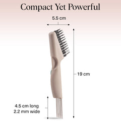 Kitsch cleaner in use on a round brush removing trapped hair for restored brush function