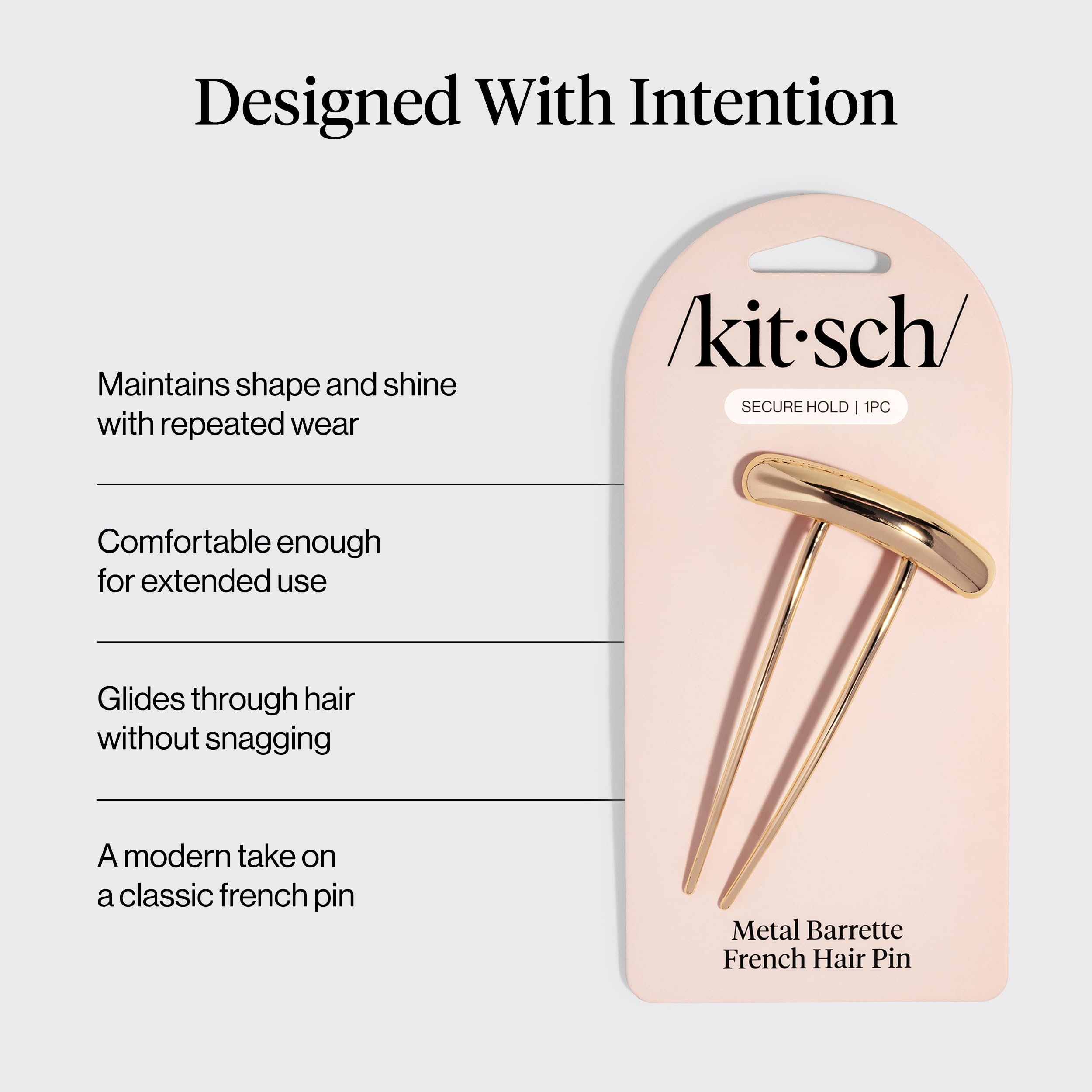 Kitsch gold pin in hand showing size and easy, lightweight handling benefit