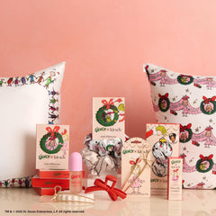Kitsch Grinch bow boxed ready for gifting showing presentable packaging