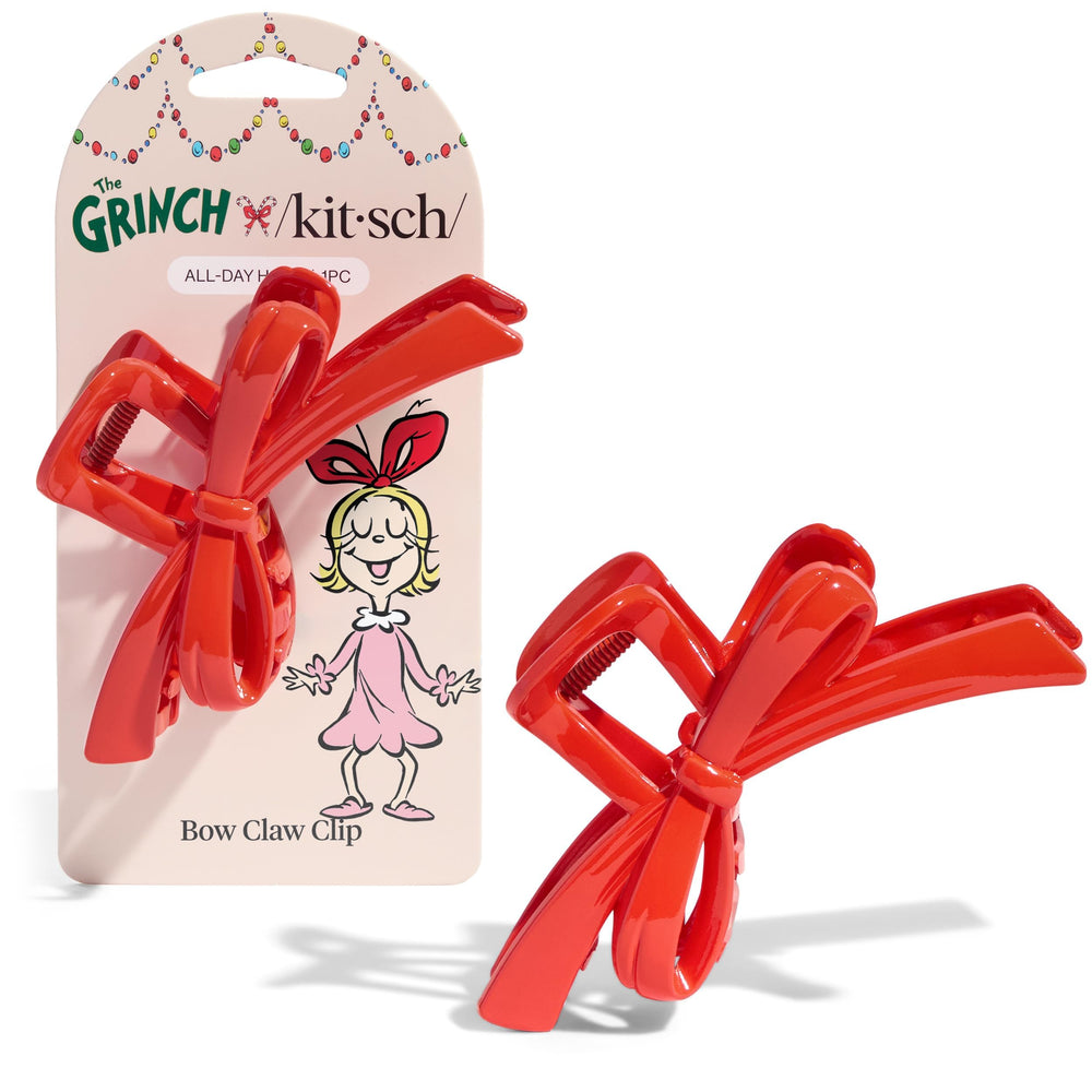 Kitsch Grinch glossy red bow front packaging showing festive design and appeal