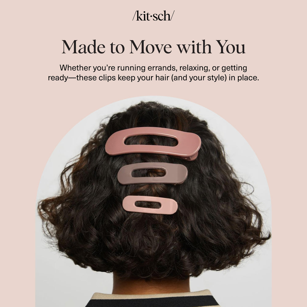 Kitsch held in hand scale showing compact size and travel-friendly design