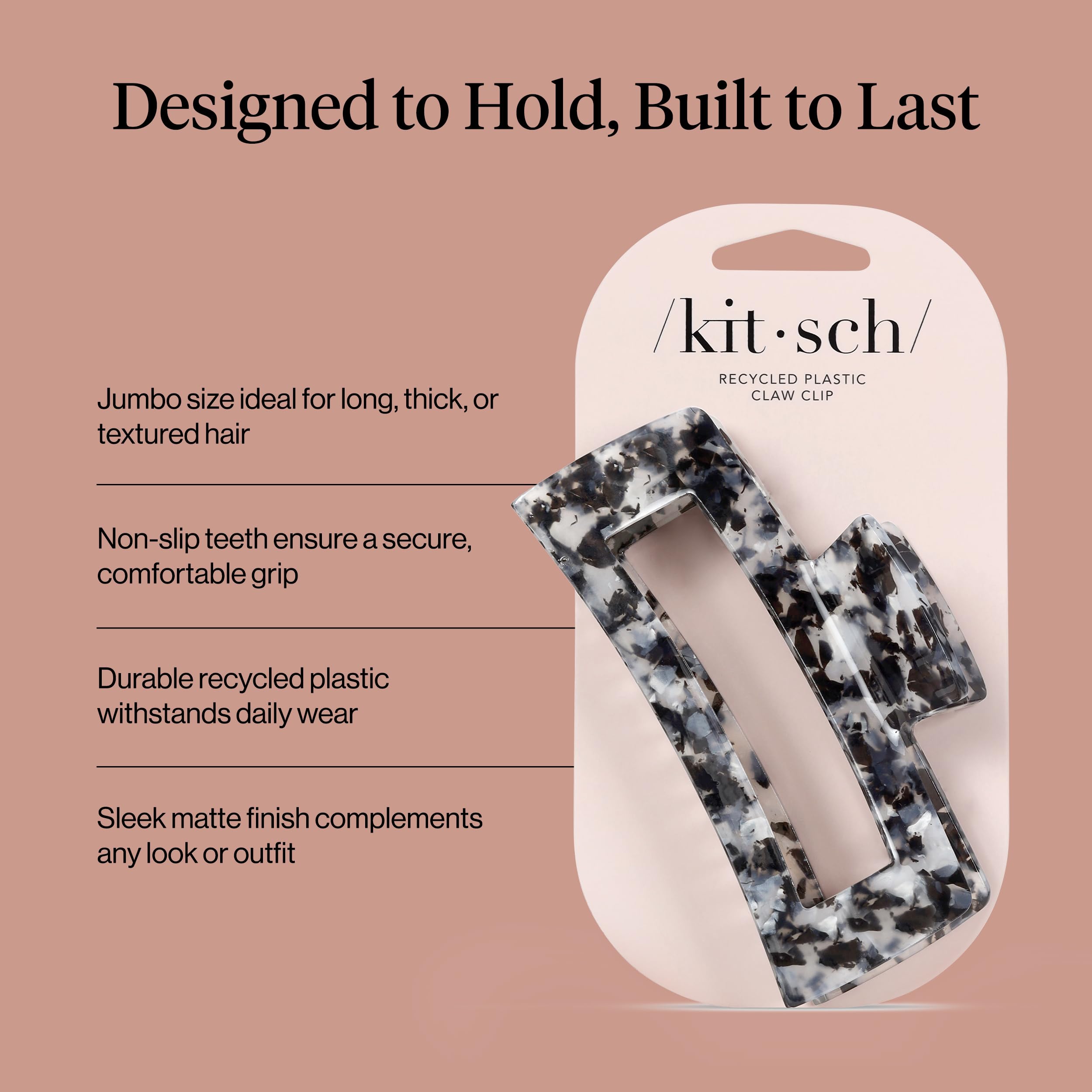 Kitsch jumbo clip held in hand demonstrating size and easy one-handed use