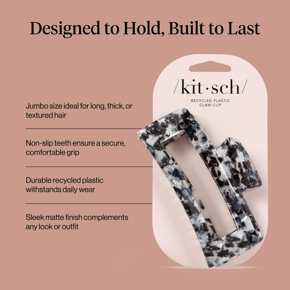 Kitsch jumbo clip held in hand demonstrating size and easy one-handed use