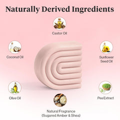 Kitsch applying bar to wet hair, illustrating detangling and frizz control benefit