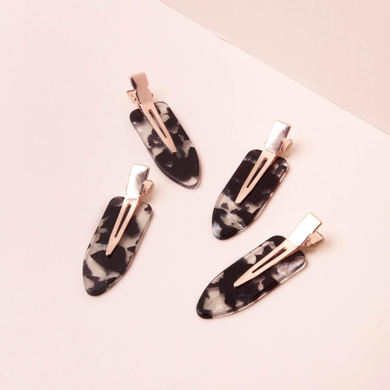 Kitsch clips on bathroom vanity keeping hair away during skincare