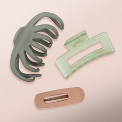 Kitsch clips peeking from a beach bag showing lightweight convenience for vacations