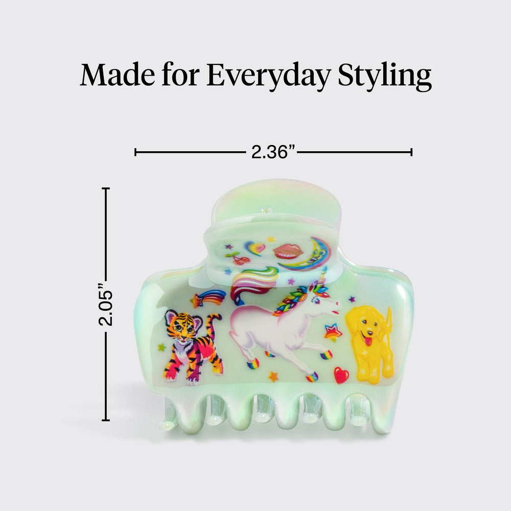 Kitsch clip held in hand to show size and comfortable medium scale for styling