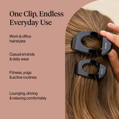 Kitsch clip next to a purse showing compact size and easy portability