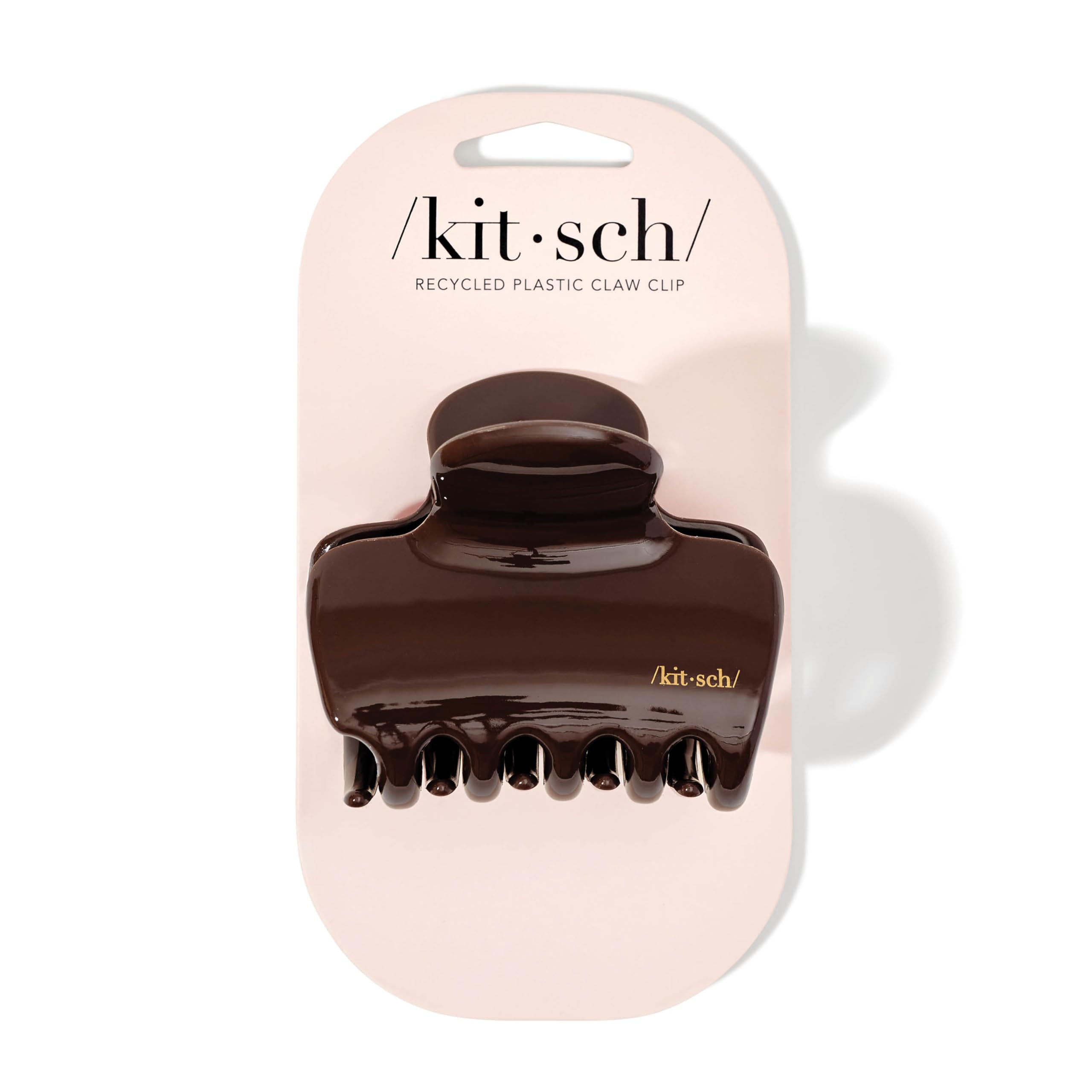 Kitsch close-up of clip teeth highlighting grip and gentle hold
