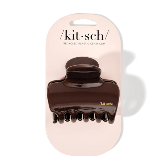 Kitsch close-up of clip teeth highlighting grip and gentle hold