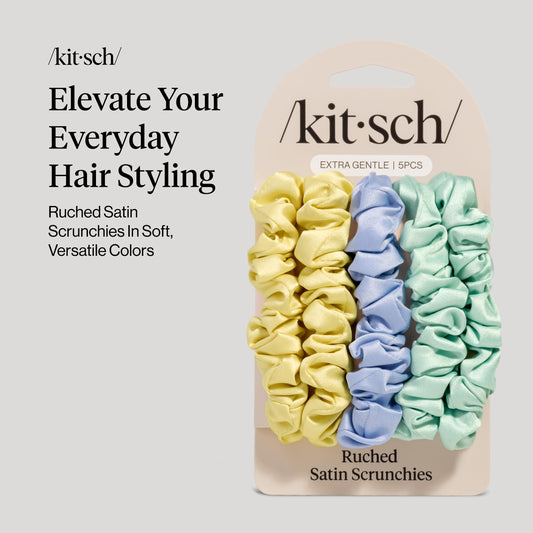Kitsch close-up of ruched satin texture showing smooth feel and low-friction benefit