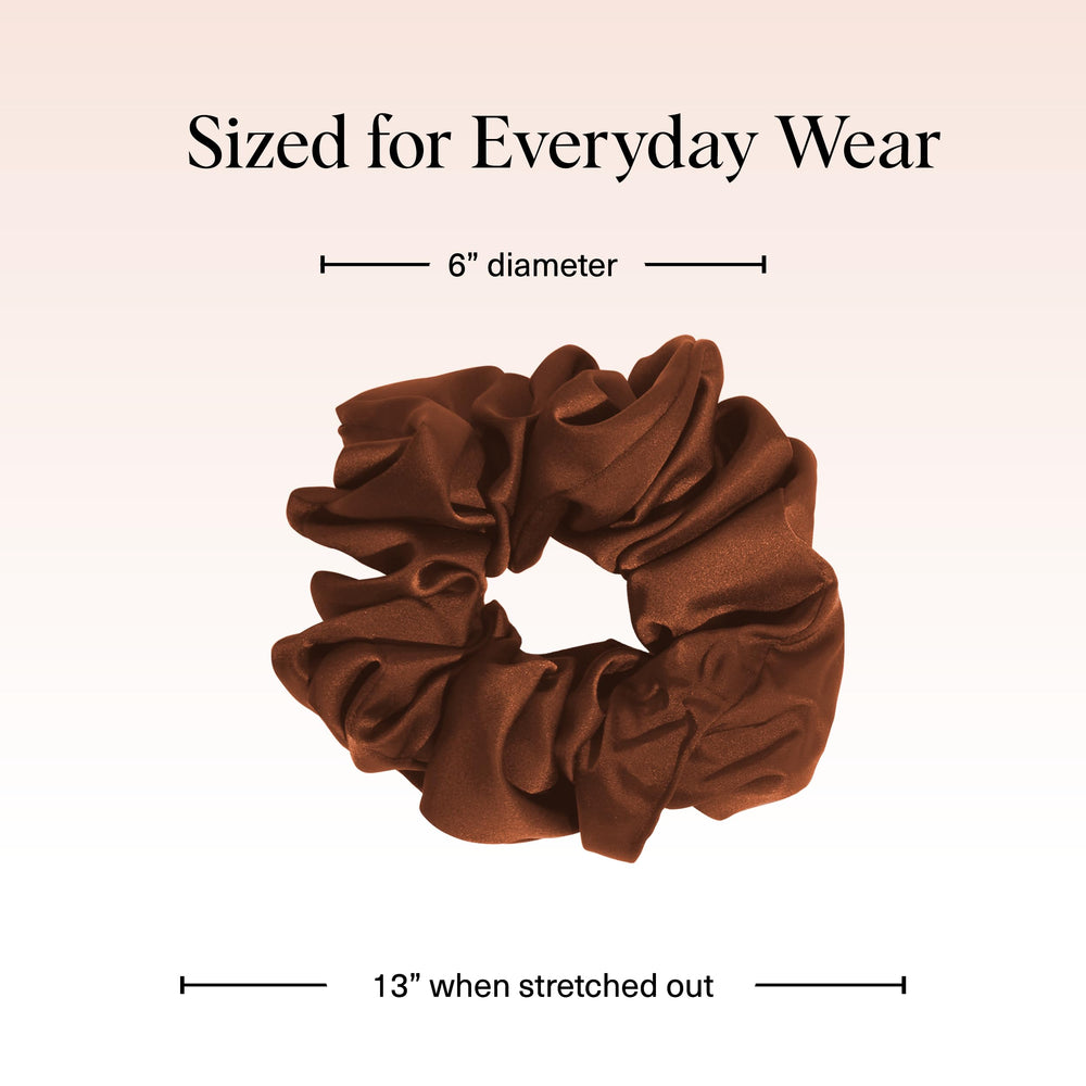 Kitsch scrunchie next to ruler showing 6-inch oversized profile for added volume benefit