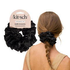 Kitsch front view of black satin ruffle scrunchie, stylish and secure hold
