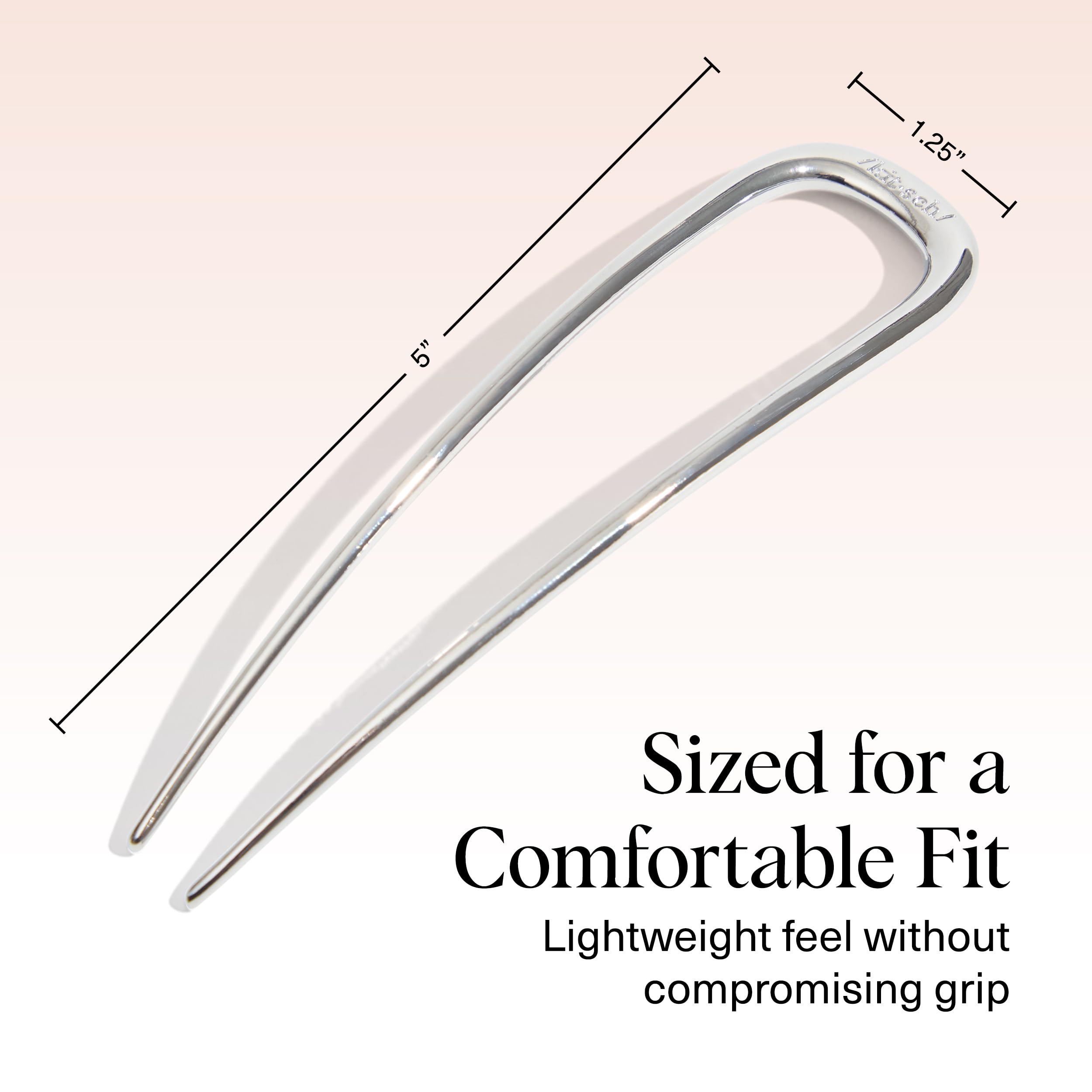 Kitsch hair pin next to coin size comparison for portability and travel ease