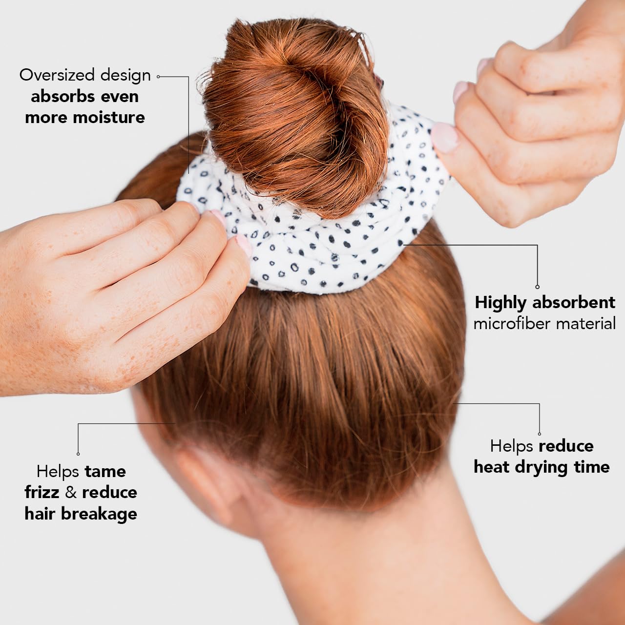 Kitsch scrunchie worn on wrist for on-the-go towel convenience