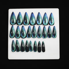 KKUUOO hand model wearing nails demonstrating dramatic stiletto look