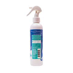 Klee Naturals mist sprayed into child's hair for easy combing benefit