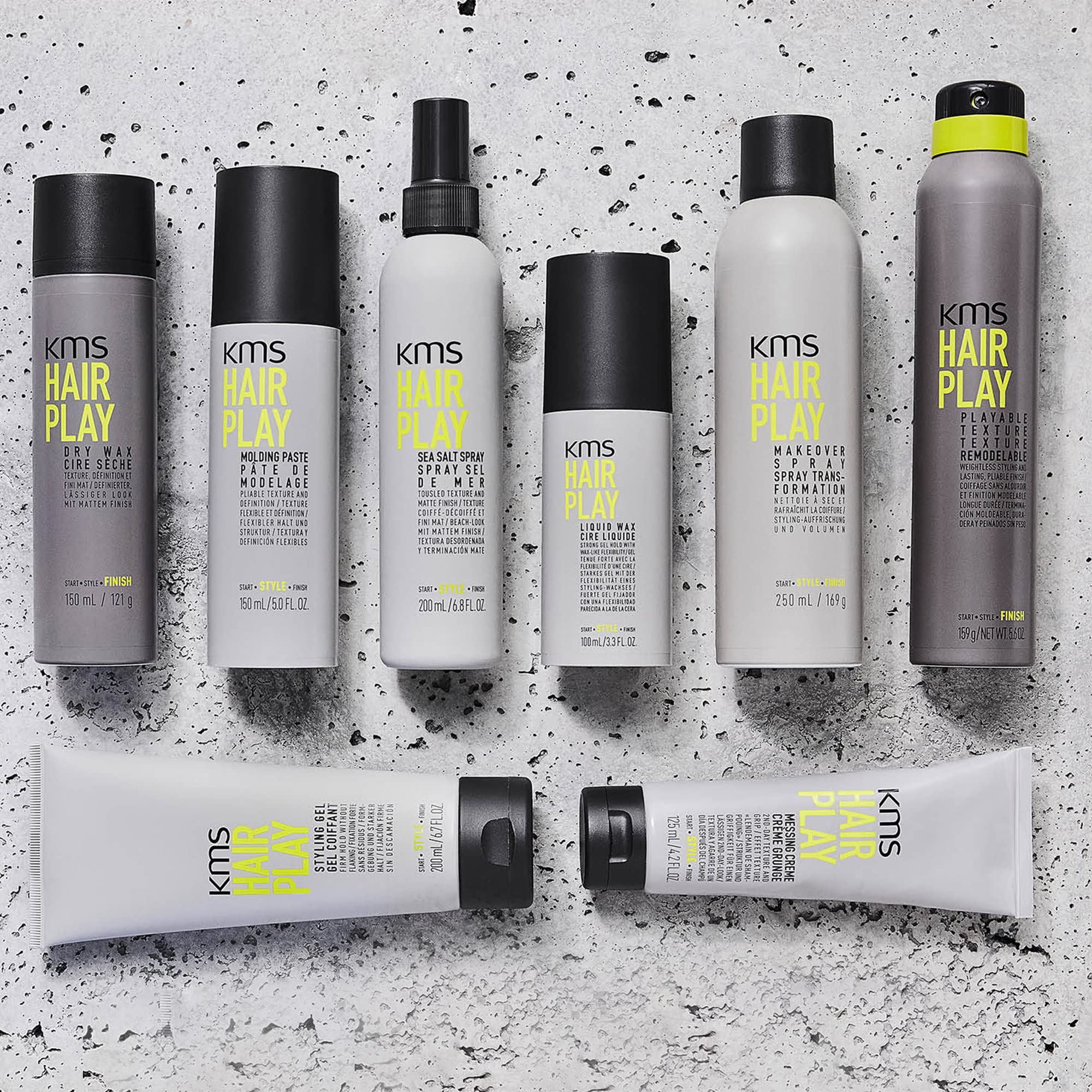 KMS paste on bathroom vanity with styling tools, suggests effortless morning styling