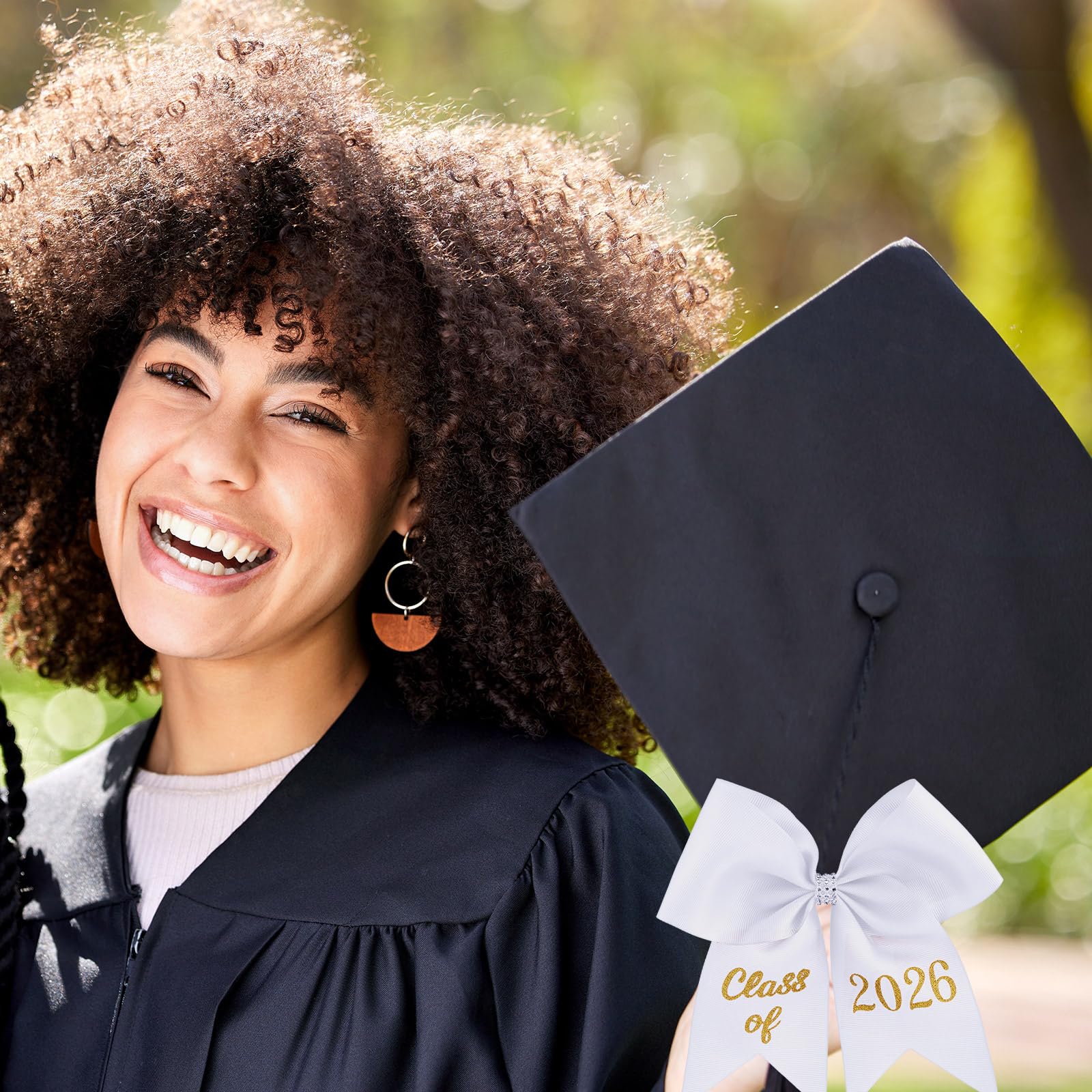 Knitgrip bow attached to mortarboard, enhances cap appearance for ceremony