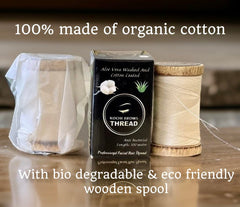 Kochi Co thread stretched between fingers demonstrating durable strength