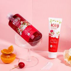 Koji White lifestyle shot of woman washing face, showing hydrated glow