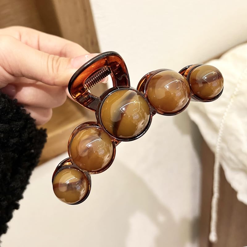 KOLONAMS side profile highlighting clip curvature and smudged brown pearl finish