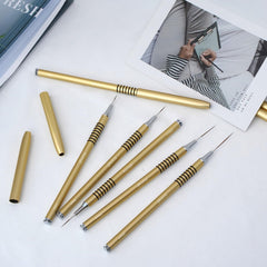 Komall brushes on a salon table with finished nails showing professional results