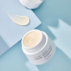 Konipl Atomy Absolute cream texture close-up demonstrating smooth, fast-absorbing finish