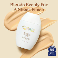 Kopari sunscreen applied on hand blending easily for quick wear