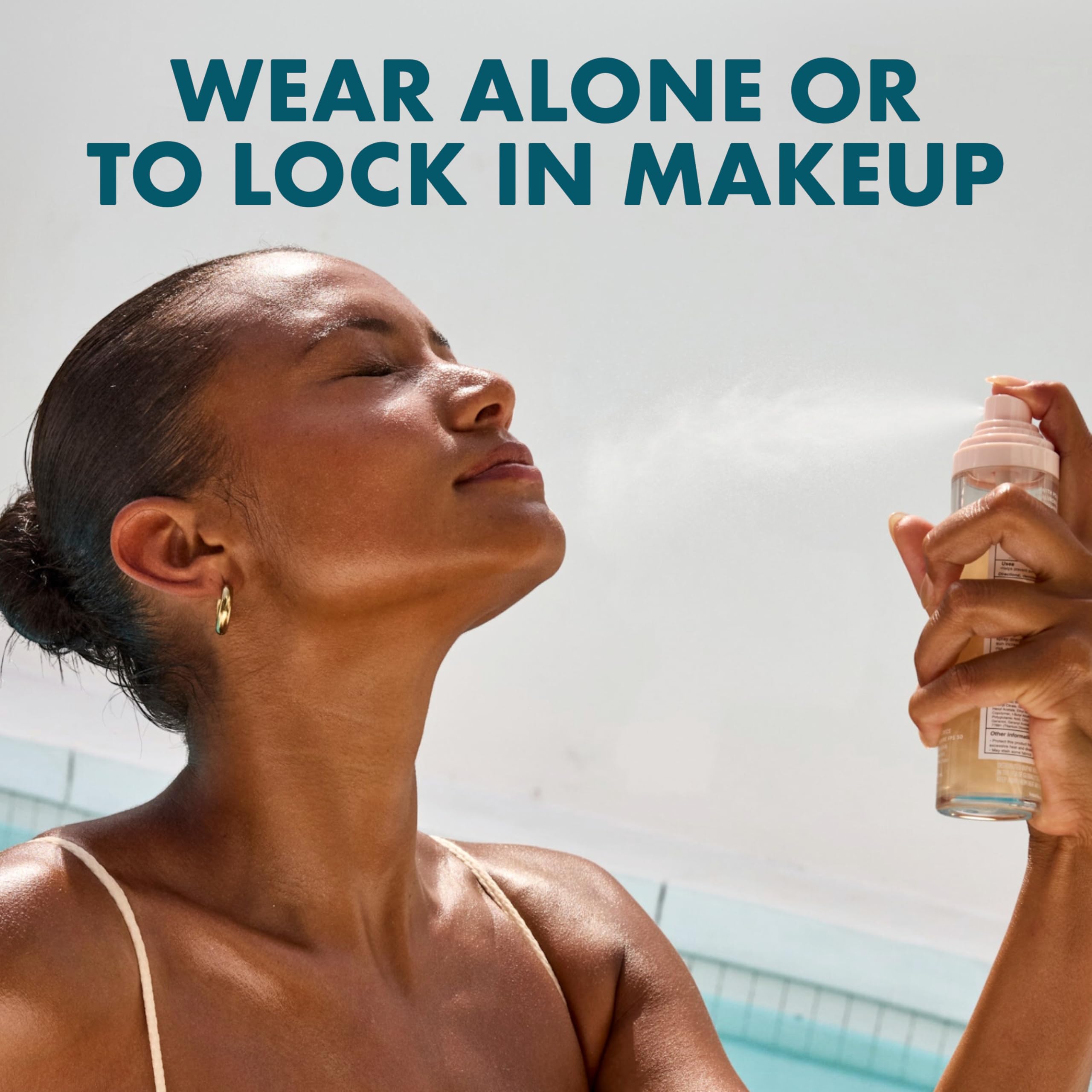 Kopari mist applied on model to set makeup and add dewy glow
