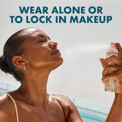 Kopari mist applied on model to set makeup and add dewy glow