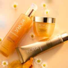 KORA Organics product and packaging flatlay highlighting certified organic branding